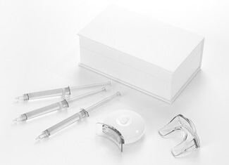 an example of a take-home teeth whitening kit from Byron L. Reintjes, DDS